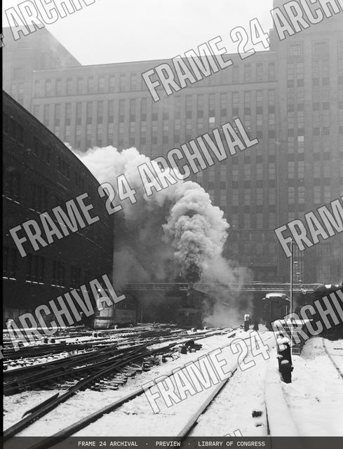 Chicago, Illinois. Trains pulling out of the station, vintage black and white photograph