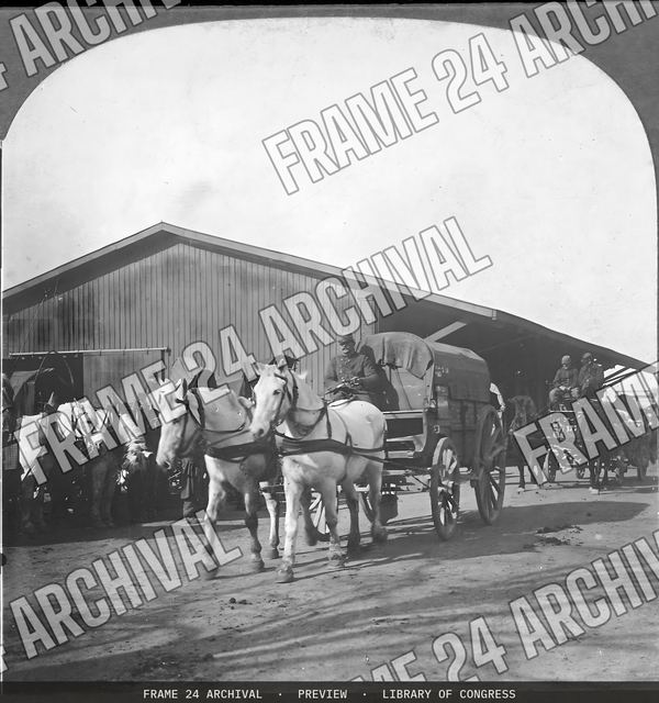 Commissariat train leaving supply station. (European War), vintage black and white photograph