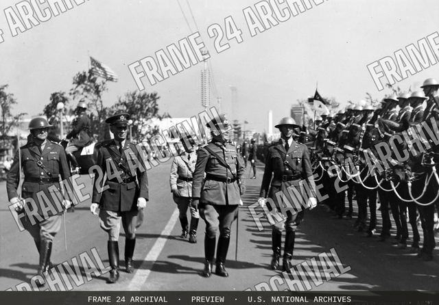 General Von Boettcher of the German Army reviewing the troops of the 14th Cavalry and the 6th Infantry, on his visit to the World's Fair, Chicago, in August 1933. These troops were stationed at Camp J, vintage black and white photograph
