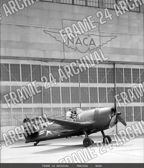 GRUMMAN F6F-3 #874 AIRPLANE on the NACA Ames flight line, vintage black and white photograph
