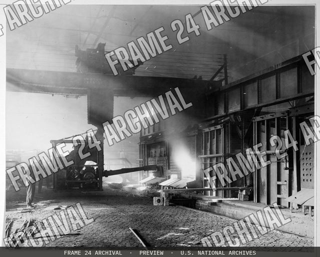 Industries of War - Metals - Steel - Carnegie Steel Company - Steel manufactured by Carnegie Steel Co., Pittsburgh. Charging slabs, jobbing mill department, vintage black and white photograph