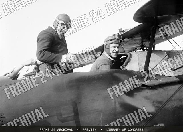 Men in airplane, vintage black and white photograph