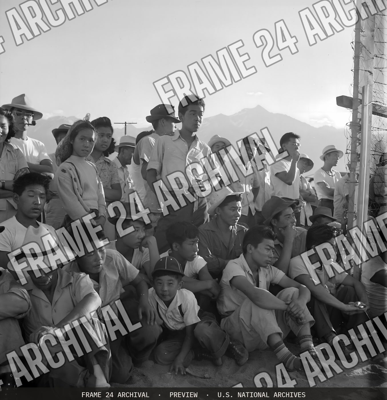 Photograph of Baseball Game Spectators, Manzanar Relocation Center (1942), restored vintage black and white photograph