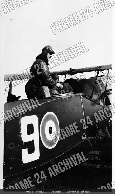 Pilot in an airplane, vintage black and white photograph