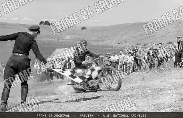 Santa Clara County, California. Motorcycle and Hill Climb Recreation. Breaking the starting tape, vintage black and white photograph