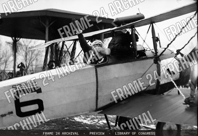 Santa in airplane, vintage black and white photograph