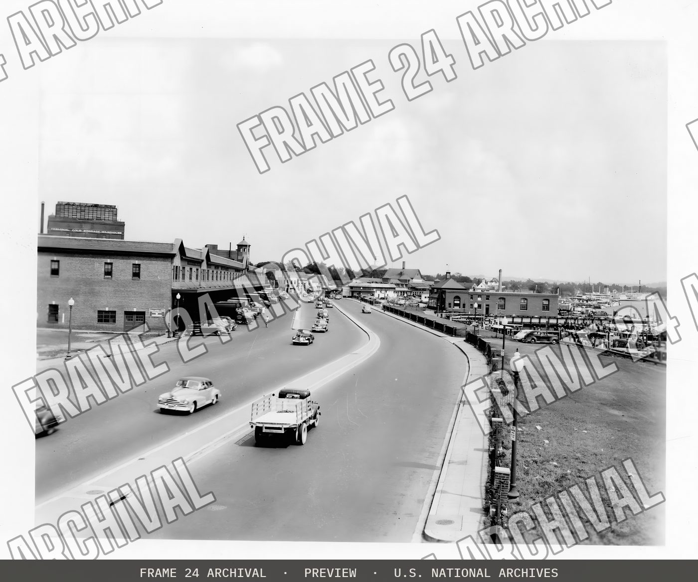 Six-lane divided city street (1947), restored vintage black and white photograph