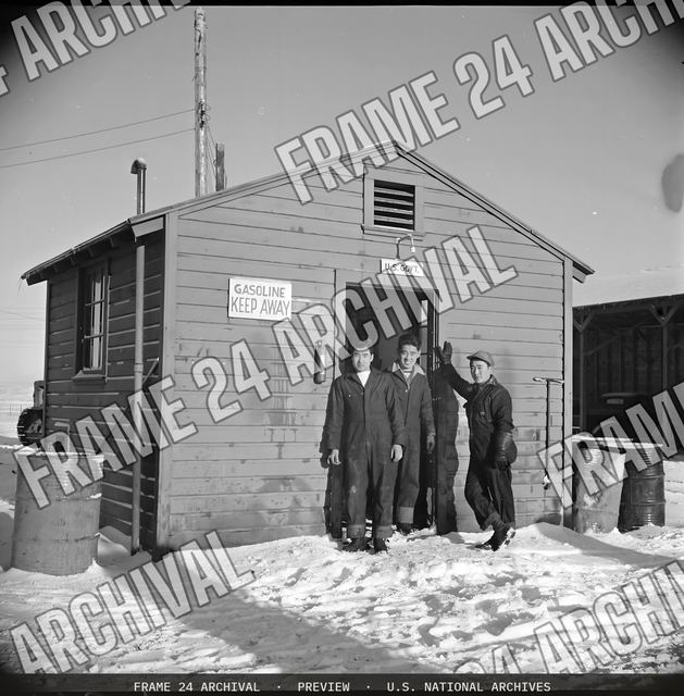 Tule Lake Relocation Center, Newell, California. Exterior views of the motor pool and gas station, vintage black and white photograph