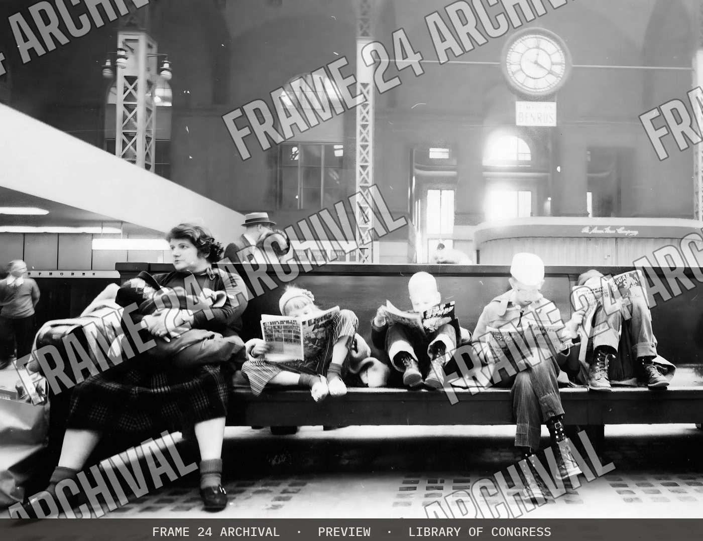 Woman and children seated on bench of train station concourse in Pennsylvania Station (1959), restored vintage black and white photograph